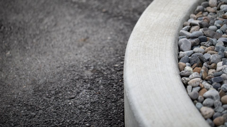 Concrete curb installed in a garden