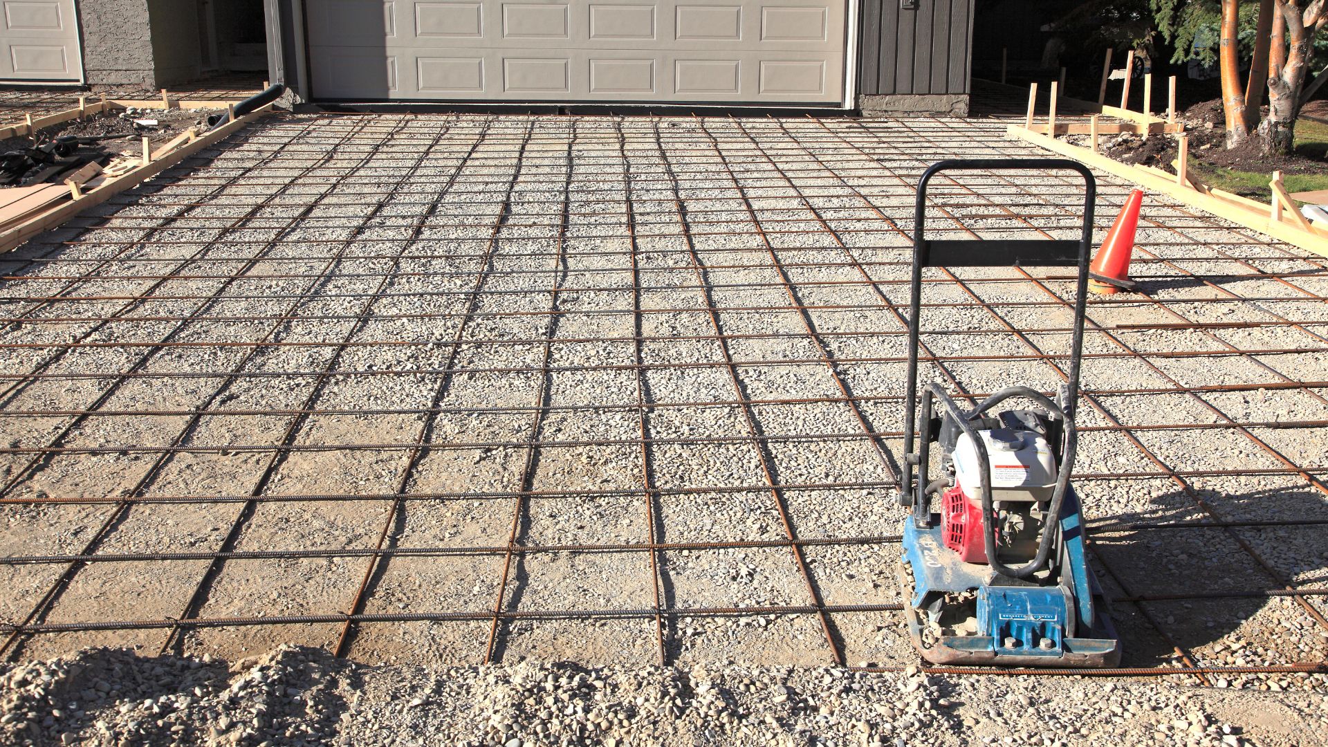 Gravel and rebar installed on a driveway ready for concrete pouring