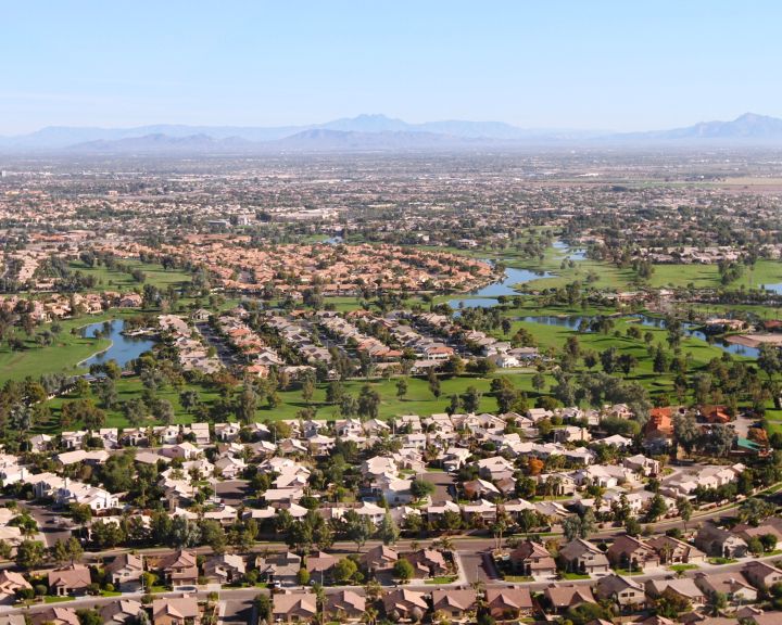 An aerial view of a residential neighborhood in Arizona with concrete contractors.