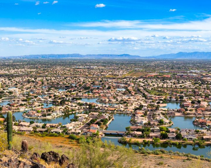 An aerial view of the city of Scottsdale, Arizona showcasing the impressive concrete landscape and beautiful stamped concrete designs.